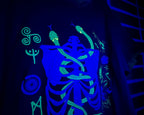Glowing blue and green design on a dark background