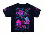 Black t-shirt with pink jellyfish and blue geometric patterns on a white background