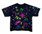 Black t-shirt with colorful graphics and text on a white background
