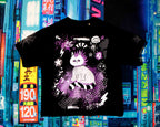 Black t-shirt with a white cat design on a colorful cityscape background