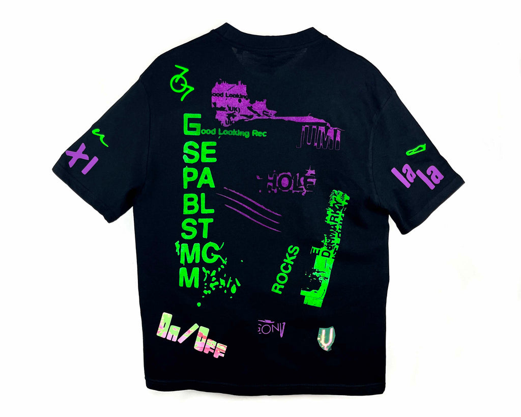 Black t-shirt with colorful text and graphics on a white background