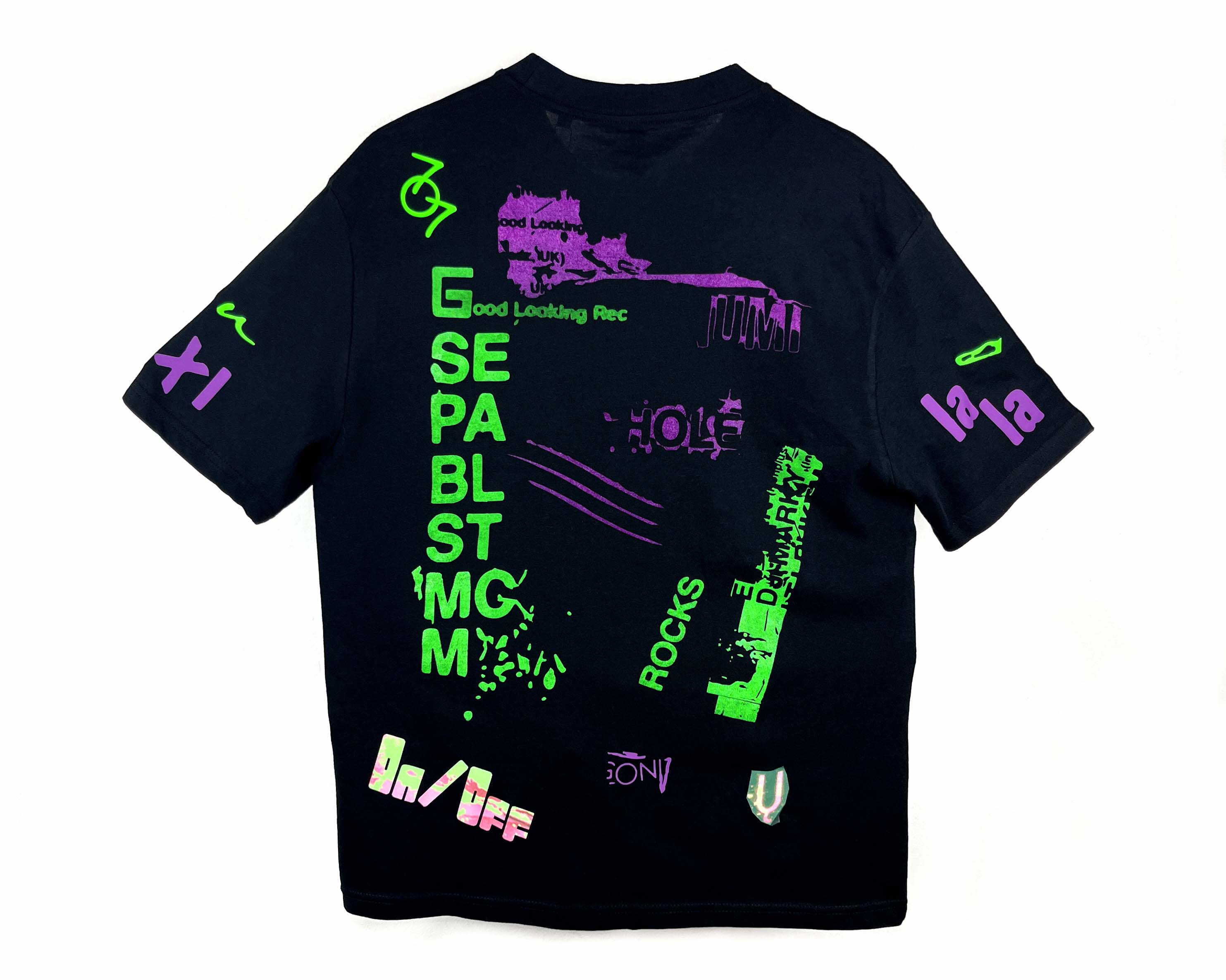 Black t-shirt with colorful text and graphics on a white background