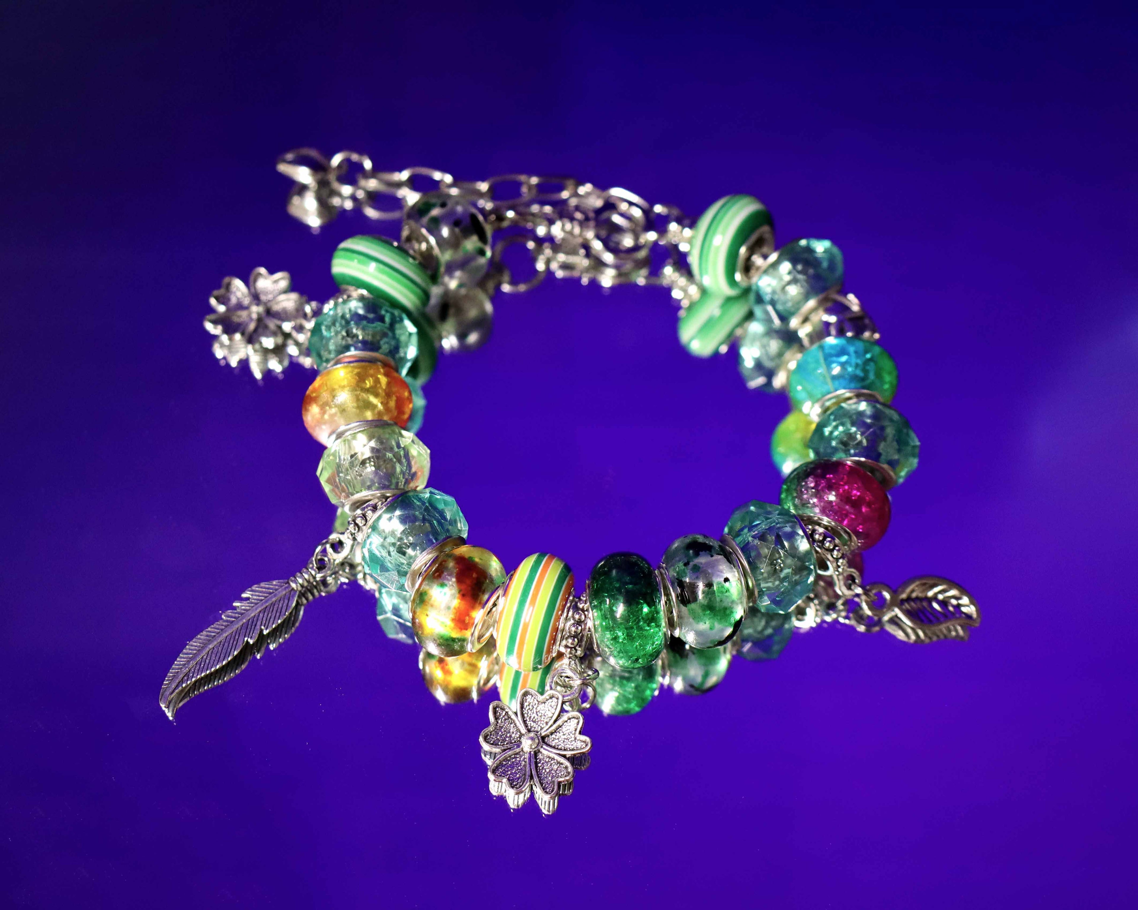 Colorful beaded charm with floral accents